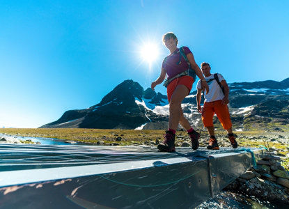 Crossing A River In Svartdalen Valley