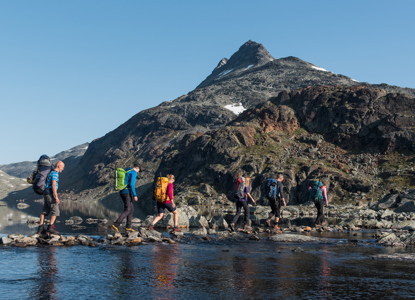 Crossing A River The Peak Uranostind In The Background